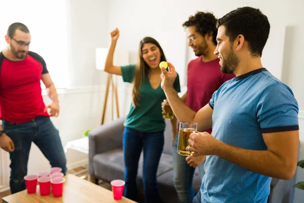 Cheerful Attractive Man Smiling While Playing Drinking Game Having Fun — Stock Photo, Image