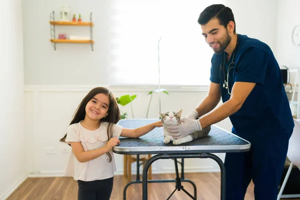 Happy Latin Little Girl Male Veterinarian Smiling While Petting Cute — Stock Photo, Image