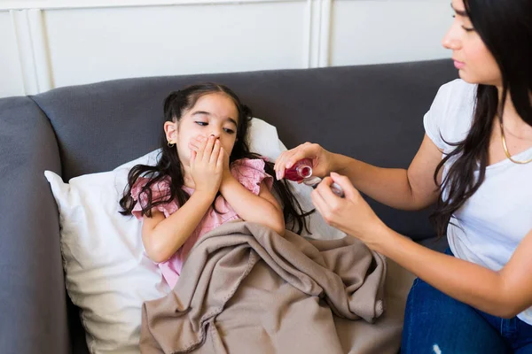 Ill Young Child Flu Covering Her Mouth Wanting Medicine Syrup — Stockfoto