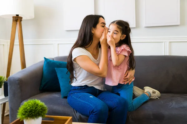 Beautiful Mom Little Daughter Playing Game Whispering Surprising Secret While — Foto Stock