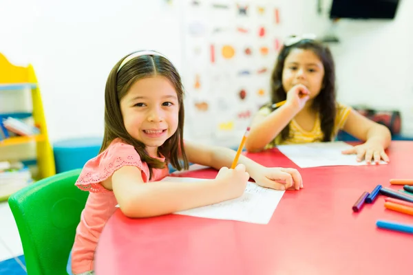 Cute Little Girl Feeling Happy While Learning Drawing Her Desk — Stockfoto