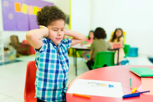 Upset Autistic Little Boy Covering His Ears Feeling Distressed Overwhelmed —  Fotos de Stock