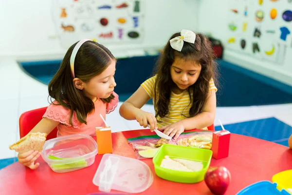 Mixed Race Girl Students Preschool Cutting Snack Learning Share Lunch —  Fotos de Stock
