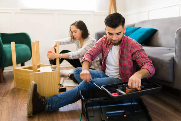 Handy Young Man Smiling While Looking His Tool Box Home —  Fotos de Stock