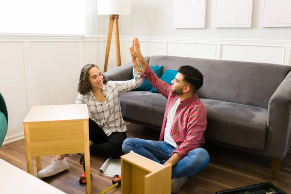 Excited Young Couple Giving High Five Celebrating Easy Work Assembling — Stock Photo, Image