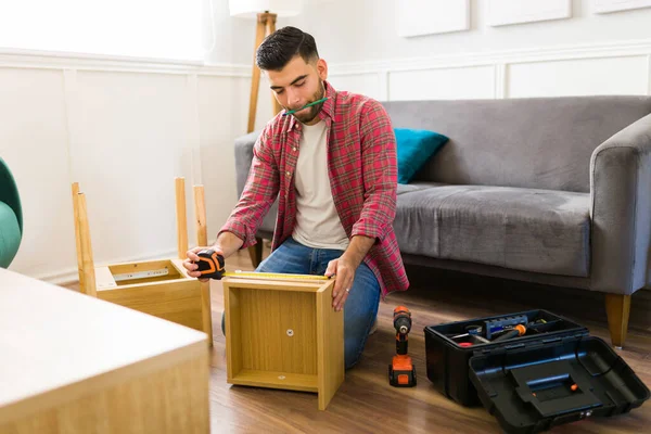 Handy Young Man Using Pencil Tape Measure While Making Self — Stok fotoğraf