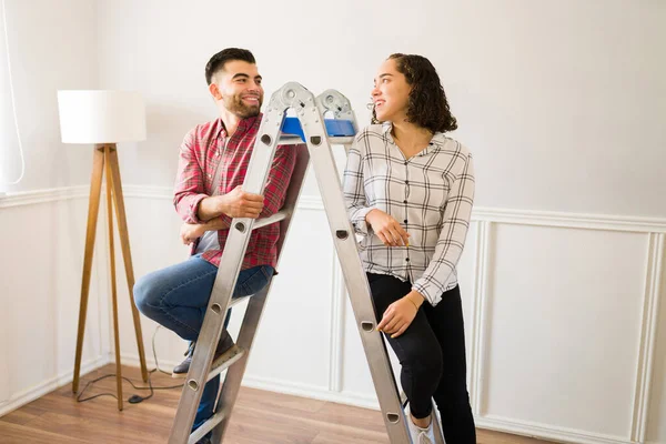 Cheerful Couple Smiling Feeling Love While Sitting Together Ladder Home — Stockfoto