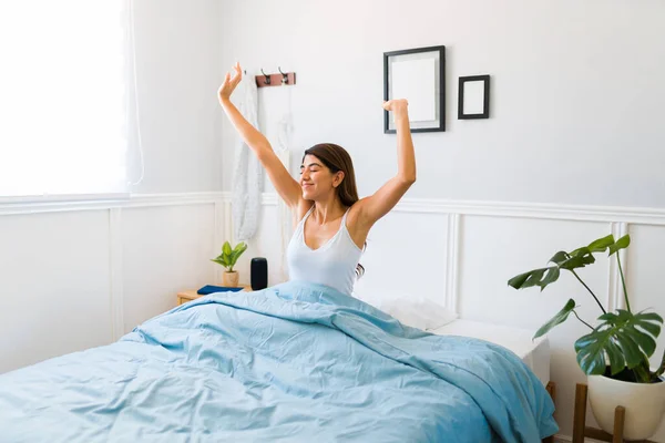 Relaxed Young Woman Stretching Her Arms Smiling Sitting Waking Good — Stock Photo, Image