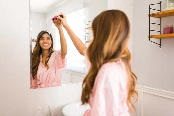 Happy Latin Woman Seen Drawing Heart Bathroom Mirror Lipstick Self — Foto Stock