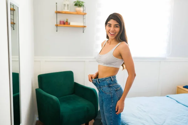 Portrait Attractive Hispanic Woman Wearing Size Too Big Jeans Feeling —  Fotos de Stock