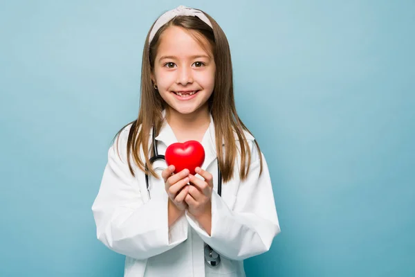 Cute Caucasian Girl Wearing Lab Coat Dreaming Becoming Doctor Heart — Zdjęcie stockowe