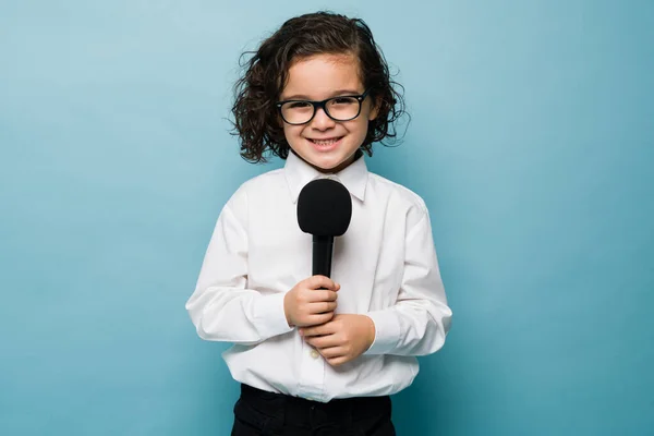Happy Kid Holding Microphone Doing Interview While Playing Host Journalist — Zdjęcie stockowe