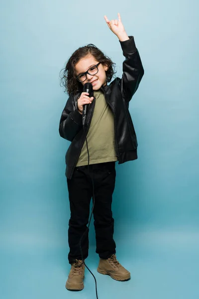 Outgoing Elementary Boy Dressed Rockstar Singing Microphone Dreaming Become Rock — Stok fotoğraf