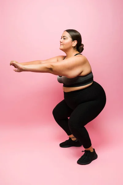 Side View Active Overweight Latin Woman Doing Squats Exercising Lose — 스톡 사진