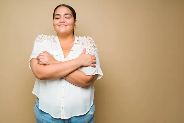 Loving Obese Young Woman Giving Herself Hug Lot Self Esteem — Foto de Stock