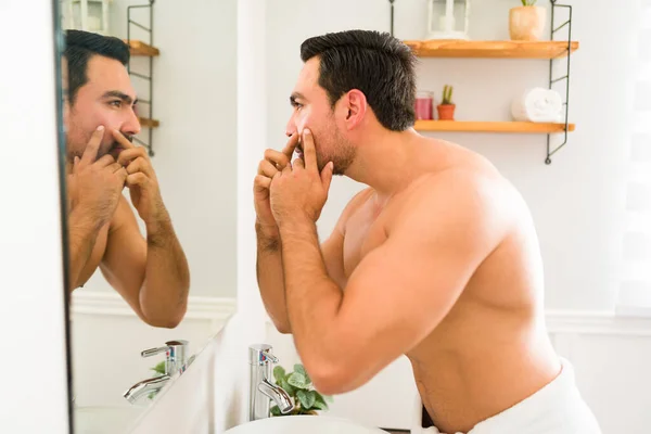 Profile Strong Latin Shirtless Man Acne Looking Bathroom Mirror Squeezing — 스톡 사진