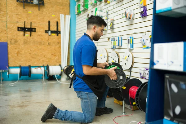 Caucasian Hardware Store Worker Apron Holding Electricity Cable Working Salesman — Fotografia de Stock