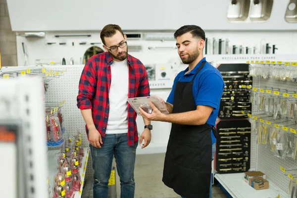 Friendly Hardware Store Worker Showing Young Man Client Shopping New — Photo