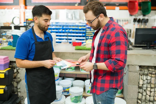 Handsome Male Worker Hardware Store Helping Customer Find Perfect Color — Foto Stock