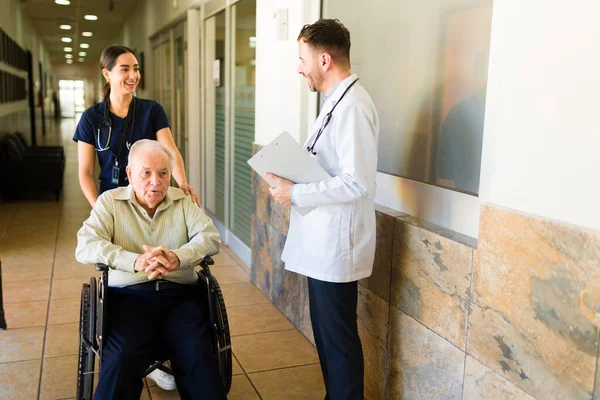 Happy Nurse Doctor Retired Mature Older Man Wheelchair Laughing While — ストック写真