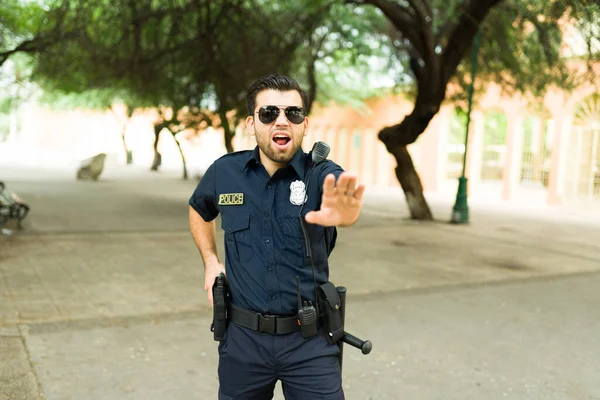 Angry Police Agent Screaming Shouting Criminal Suspect Reaching His Gun — Stock Photo, Image