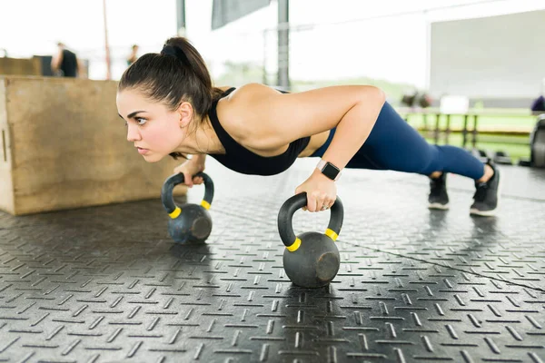 Side View Strong Athletic Woman Doing Push Ups Exercises While — стоковое фото