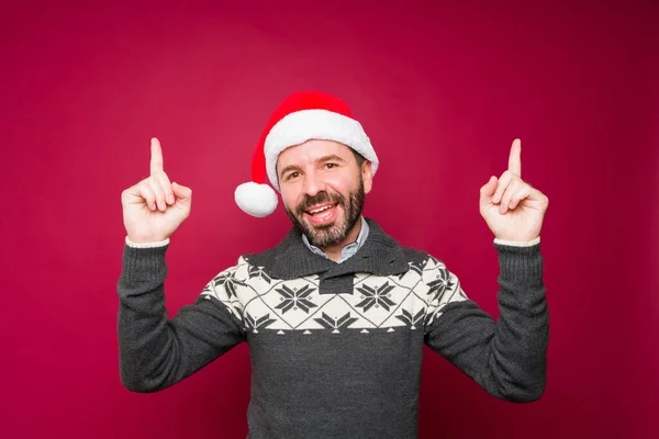 Attractive Latin Man Looking Excited While Pointing Copy Space Christmas — Stock Photo, Image