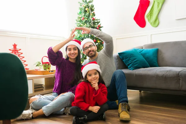 Beautiful Parents Young Child Making Home Gesture Enjoying Family Christmas — Stock Photo, Image