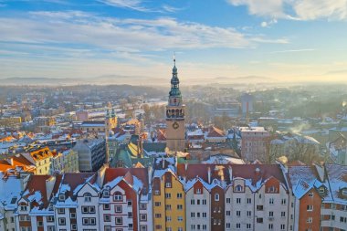 Klodzko, Poland, January 5, 2022: City view from above on a foggy winter sunny morning