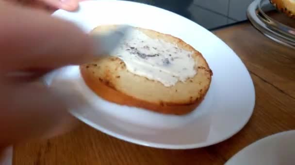 Girl Spreads Butter Melted Cheese Bread Breakfast Preparation Light Food — Vídeos de Stock