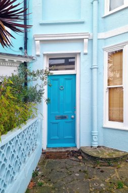 Beautiful entrance wooden door in a multi-storey building