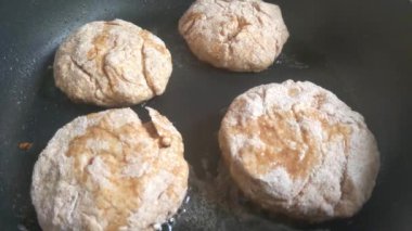 Cheesecakes are baked in a frying pan. Breakfast preparation. Light and tasty lunch. Healthy food. Healthy lifestyle and nutrition