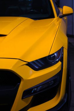 Wroclaw, Poland, August 23, 2021: yellow modern and powerful car Ford Mustang. Sale of new cars