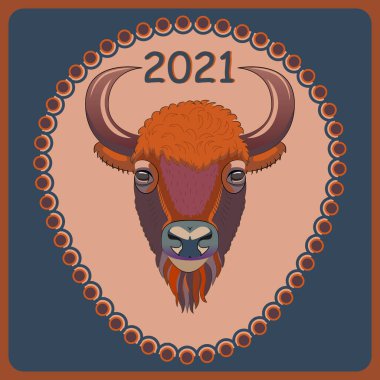 Bison head. Portrait of a wild bull. A handsome bull.