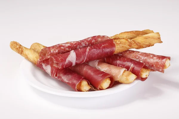 Set of salami and bacon with cheese biscuits — Stock Photo, Image
