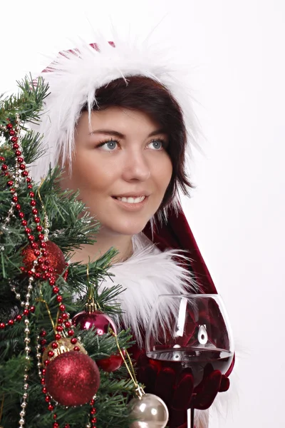 Christmas girl with wine is smiling — Stock Photo, Image