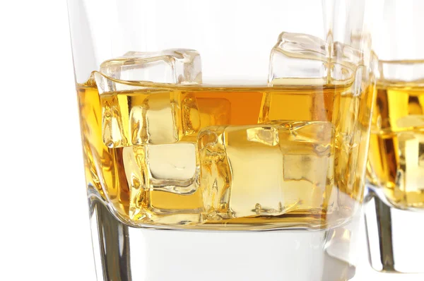 Glass of whisky with ice — Stock Photo, Image