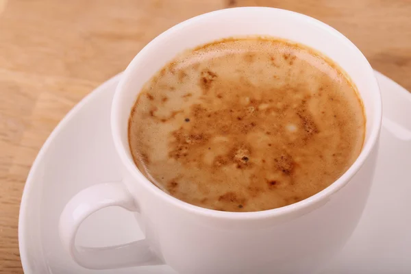 Cup of cappuccino with foam — Stock Photo, Image