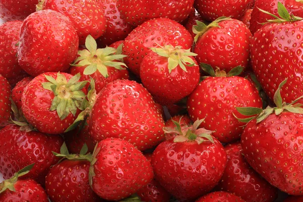 Ripe strawberries in bulk Royalty Free Stock Photos