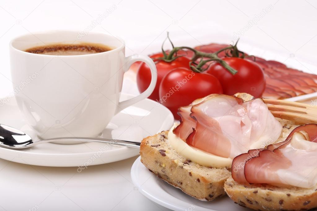 Coffee, sandwich and bacon
