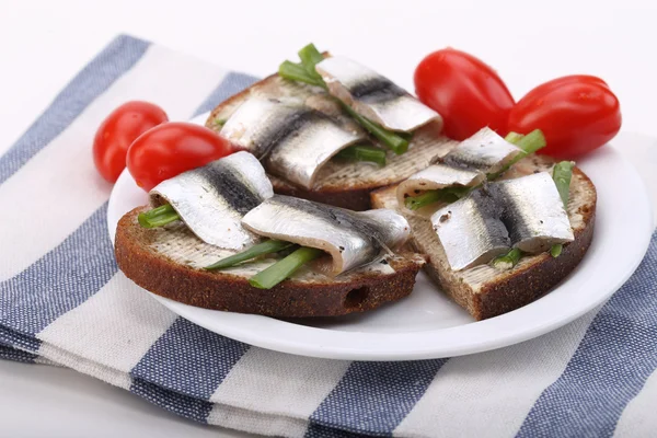 Baltic sprat on the bread — Stock Photo, Image