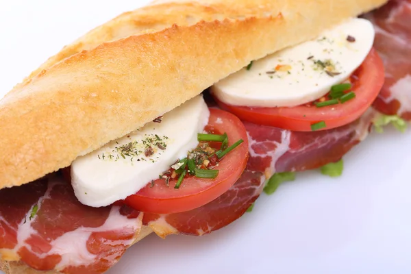 Sandwich with ham, mozzarella and tomato — Stock Photo, Image