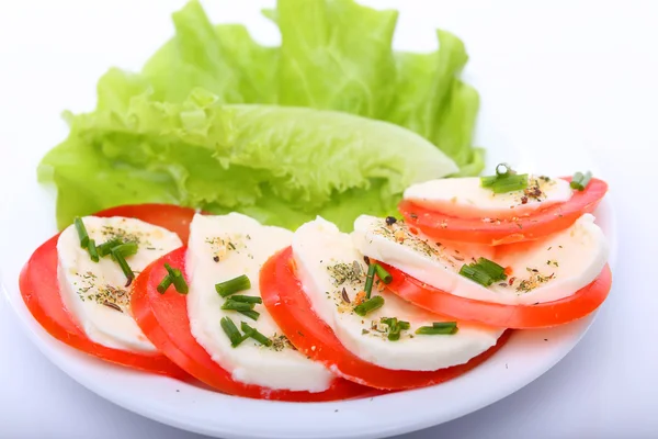 Tomate com mussarela e salada — Fotografia de Stock