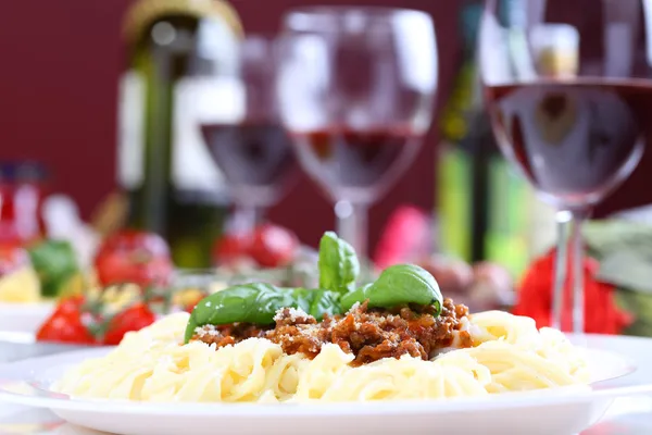 Pasta bolognese with basil and cheese — Stock Photo, Image