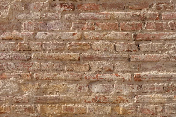 Vecchio muro di mattoni e intemperie — Foto Stock