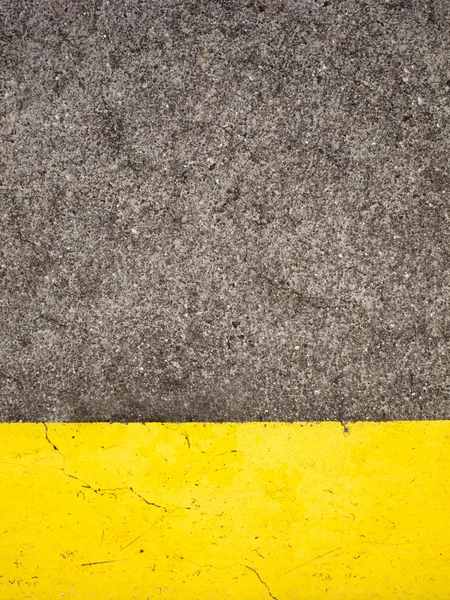 Cemento y pintura amarilla — Foto de Stock