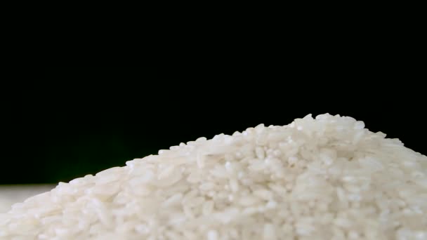 Rice Grains Heap Pile Black Background Dolly Shot Close Macro — Video Stock