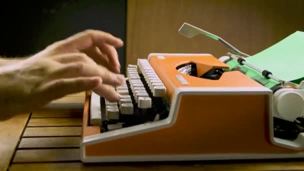 Male Hands Typing Vintage Typewriter Old Mechanical Orange White Green — Vídeos de Stock