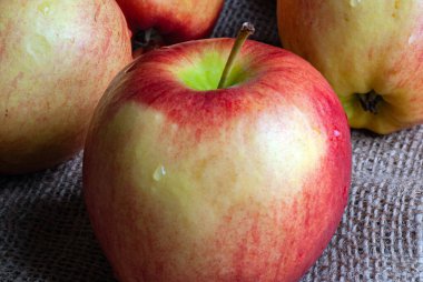 Ripe red apples close-up as a package design element.