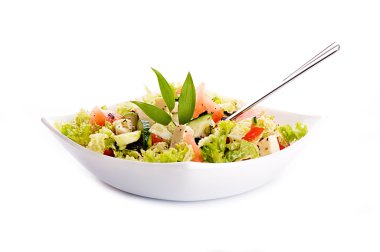 Salad from fresh green-stuffs and cheese with spices